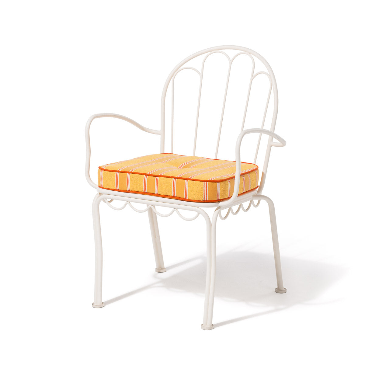 A white metal garden armchair with a curved backrest and armrests, featuring a striped yellow, orange, and red cushion on a clean white background.