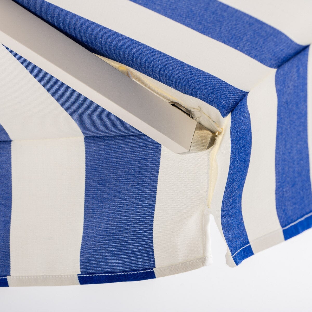 The Resort Market Umbrella in Crew Mediterranean Blue Stripe | 8' Antique White Frame Resort Market Umbrella Kit Business & Pleasure Co.