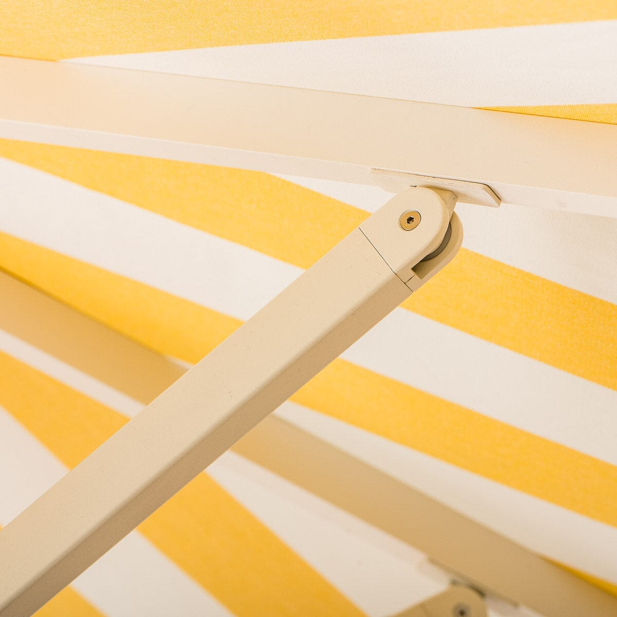 The Resort Market Umbrella in Crew Mimosa Yellow Stripe | 10' Antique White Frame Resort Market Umbrella Kit Business & Pleasure Co.