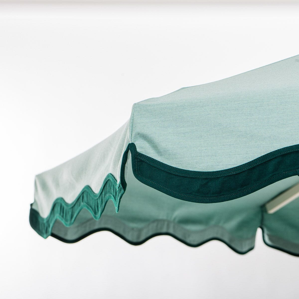 The Resort Market Umbrella in Rivie Green | 10' Antique White Frame Resort Market Umbrella Kit Business & Pleasure Co.