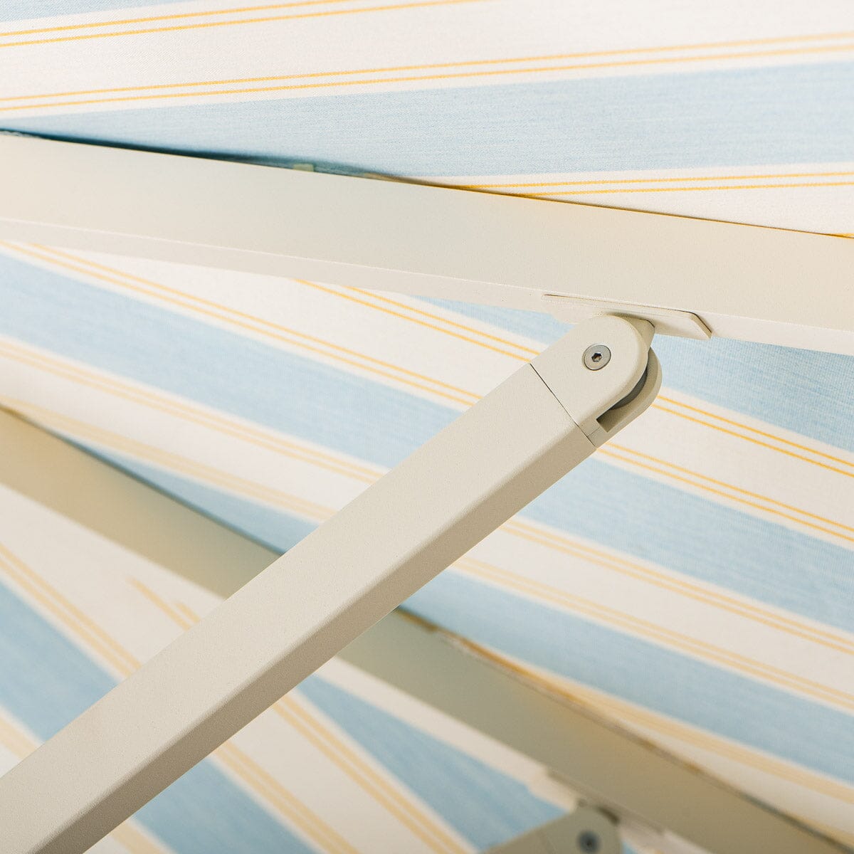 The Resort Market Umbrella in Tuuli Stripe Blue | 10' Antique White Frame Resort Market Umbrella Kit Business & Pleasure Co.