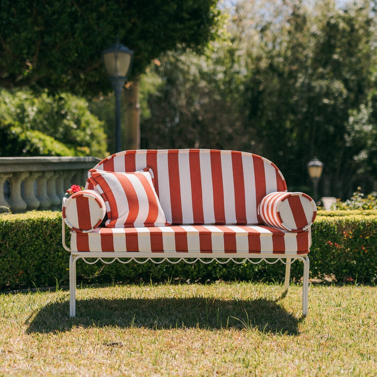 The Al Fresco Love Seat in Crew Le Sirenuse Stripe | Antique White Frame Al Fresco Love Seat Kit Business & Pleasure Co.