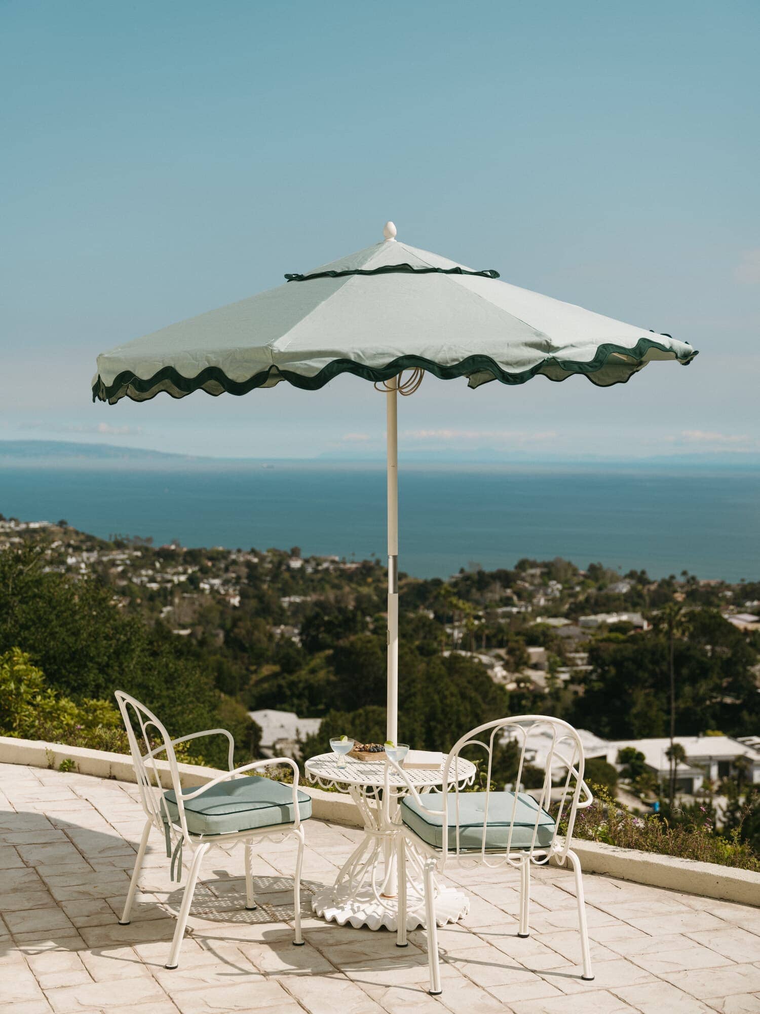 Al fresco chairs, table and umbrella on a patio