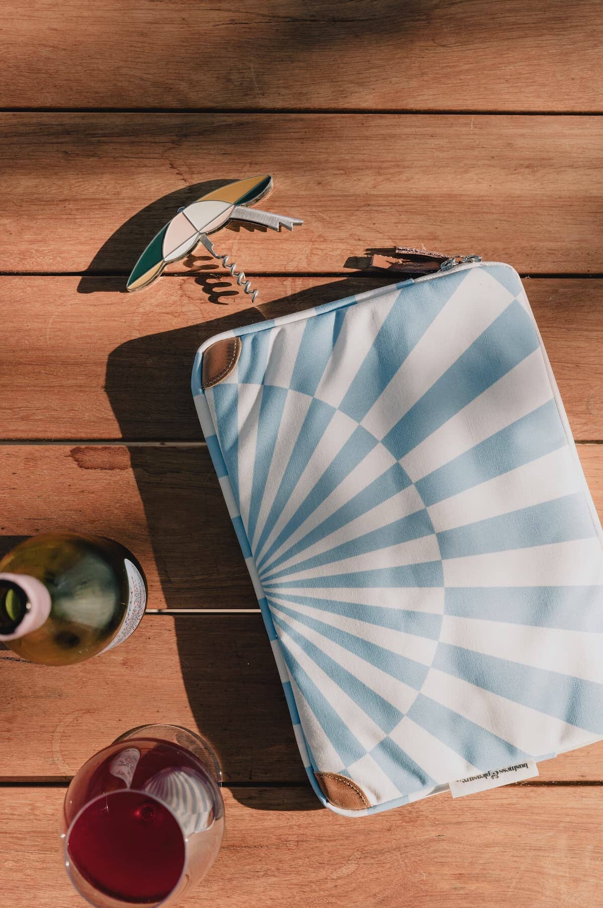 Blue spiral laptop sleeve on a table