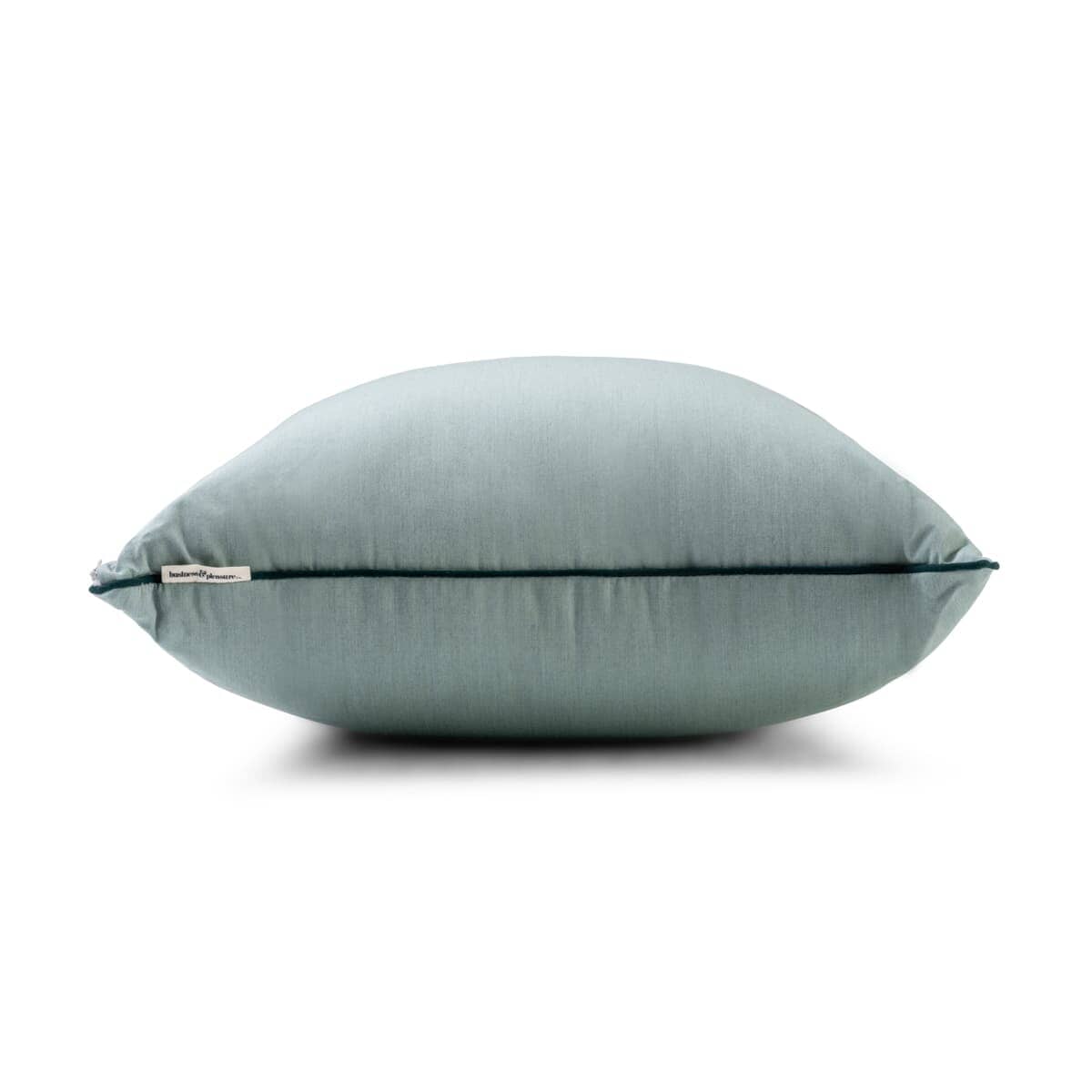 Studio image of riviera green throw pillow