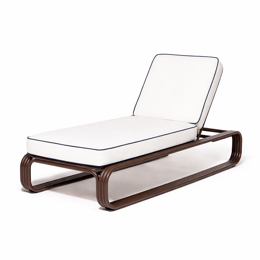 Modern lounge chair with white cushion on a white background