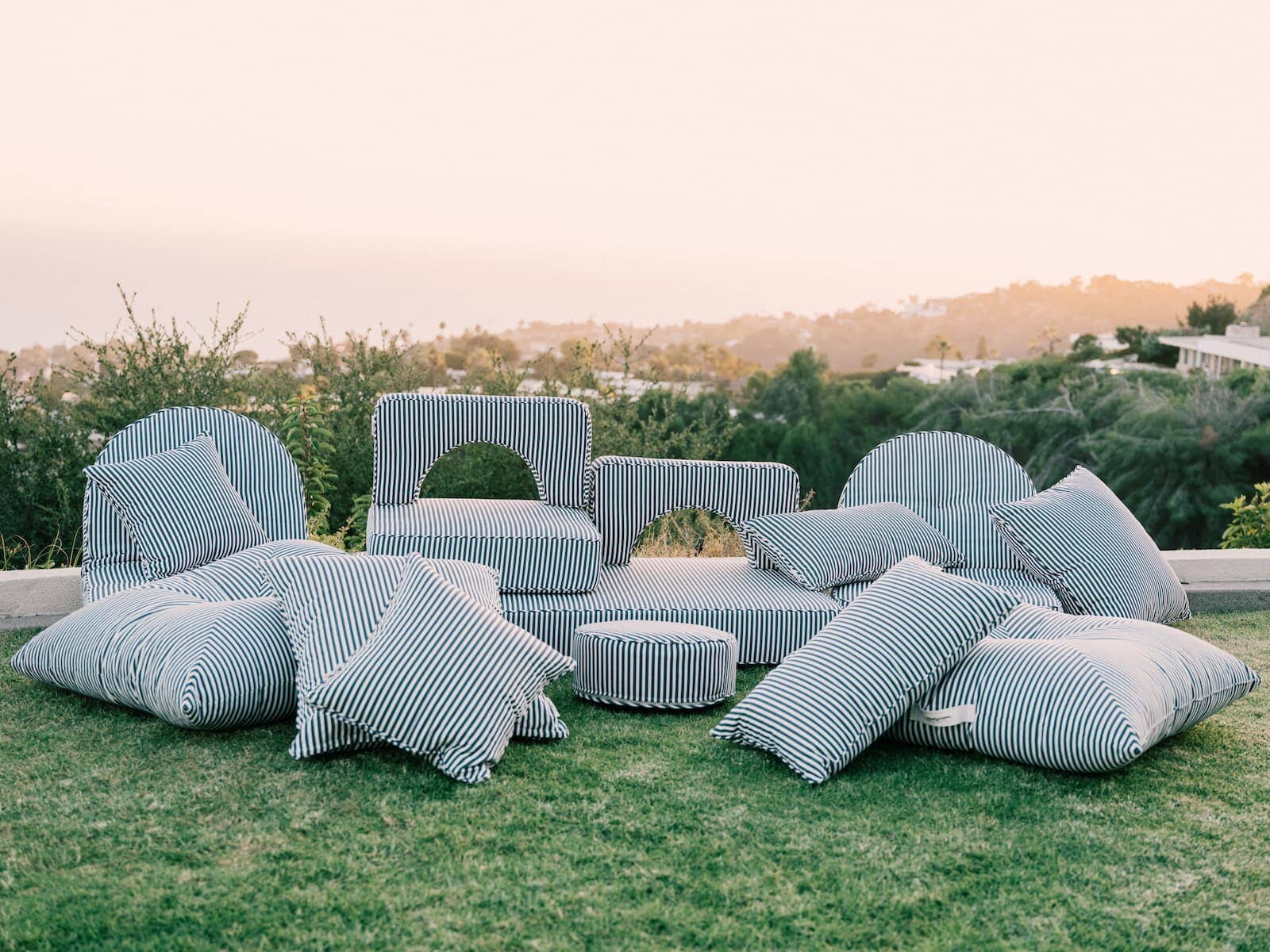 complete cushion collection on grass in yard