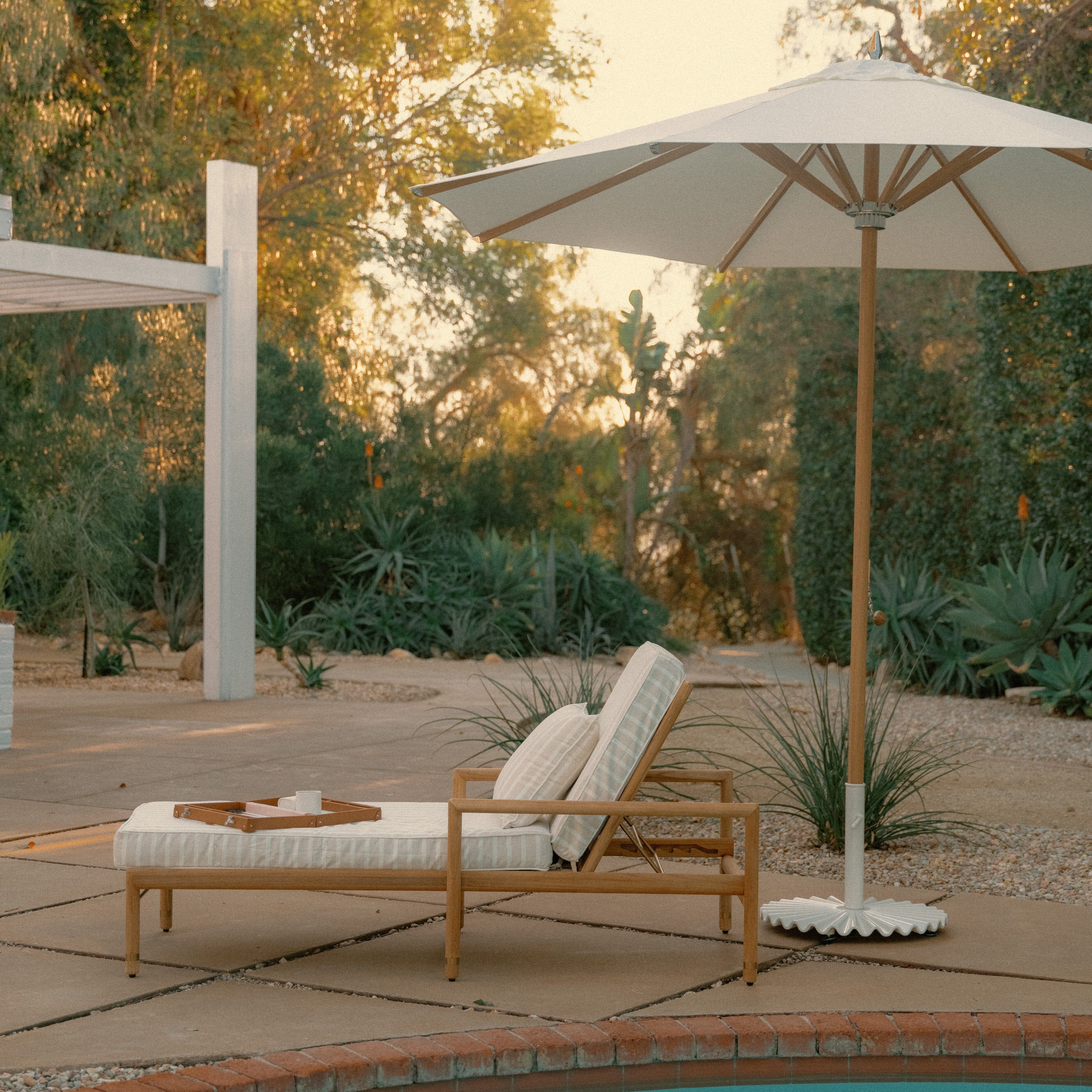 The WES Sun Lounger in Monaco Natural Stripe | Teakwood Gold Frame Wes Sun Lounger Kit Business & Pleasure Co Aus 