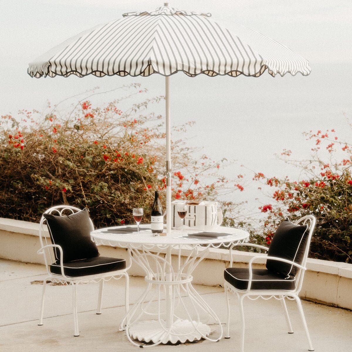 The Al Fresco Dining Chair in Rivie Black | Antique White Frame Al Fresco Dining Chair Business & Pleasure Co Aus 