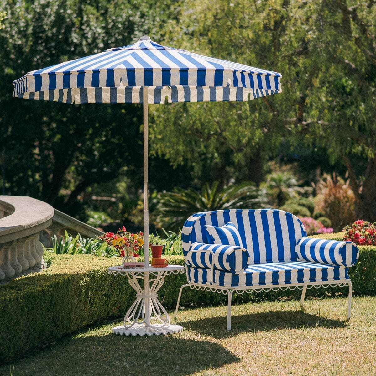 The Al Fresco Love Seat in Crew Mediterranean Blue Stripe | Antique White Frame Al Fresco Love Seat Kit Business & Pleasure Co. 