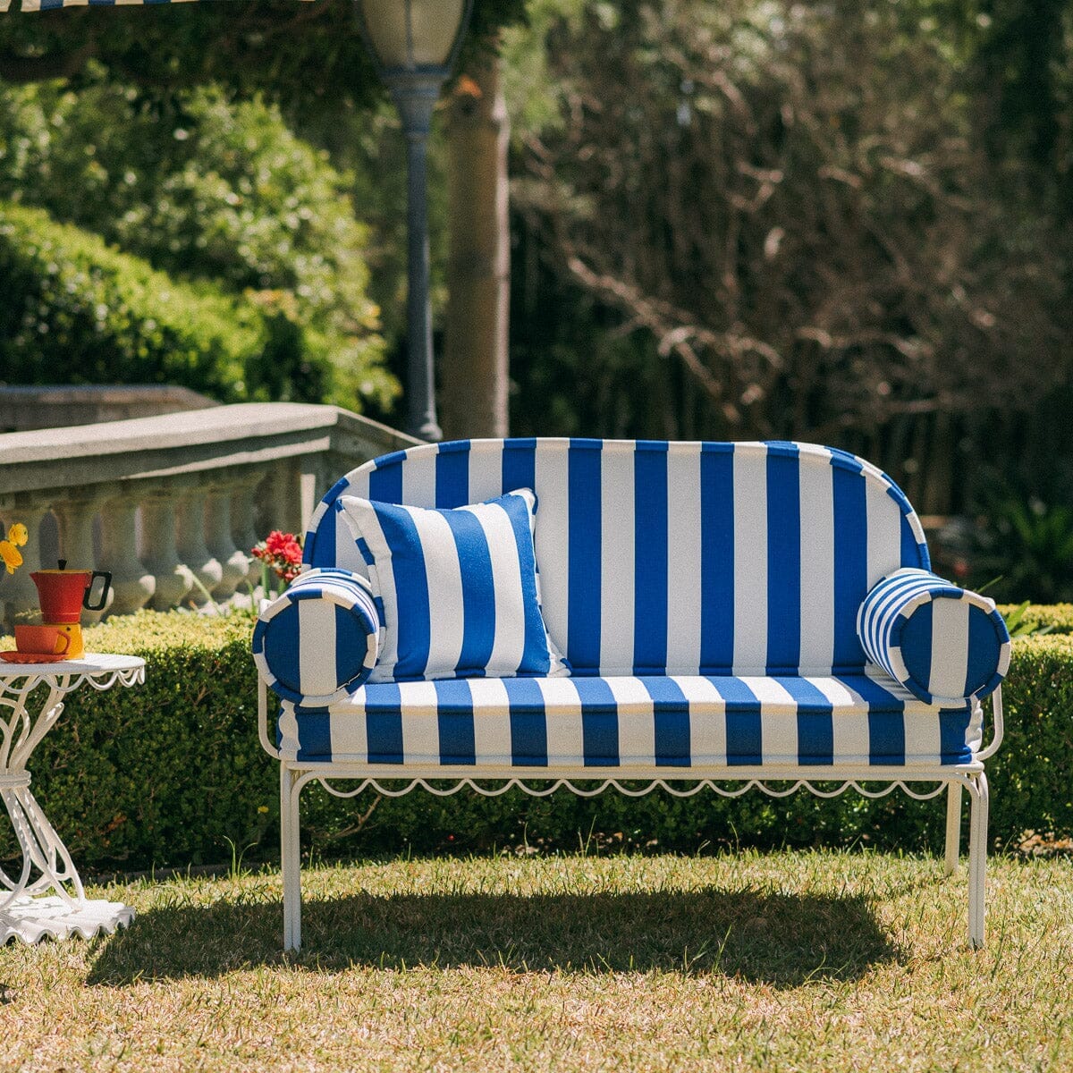 The Al Fresco Love Seat in Crew Mediterranean Blue Stripe | Antique White Frame Al Fresco Love Seat Kit Business & Pleasure Co. 