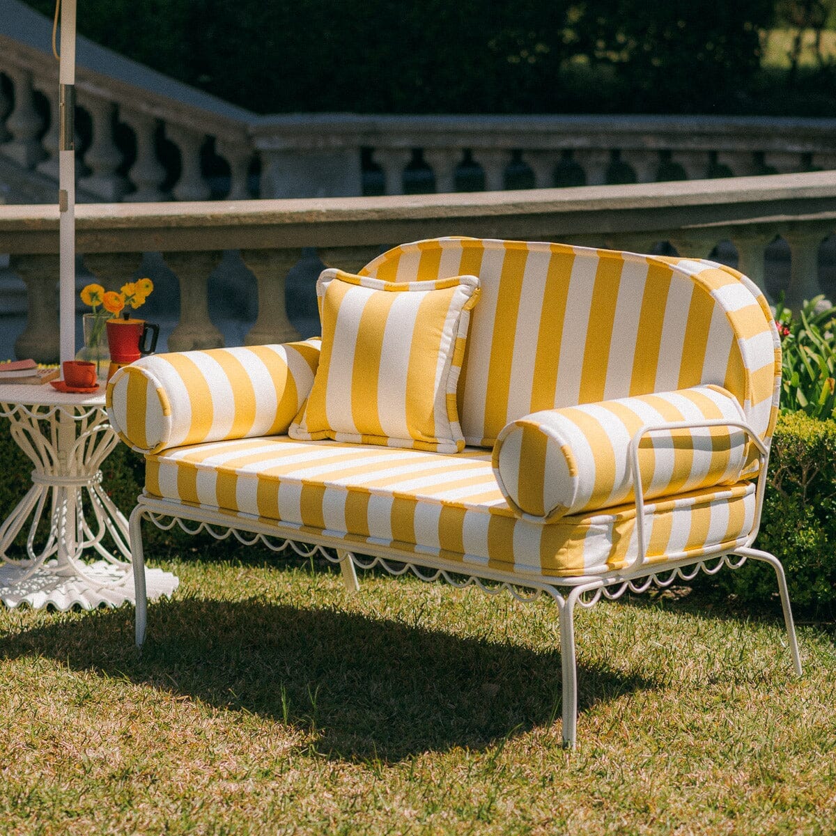 The Al Fresco Love Seat in Crew Mimosa Yellow Stripe | Antique White Frame Al Fresco Love Seat Kit Business & Pleasure Co. 