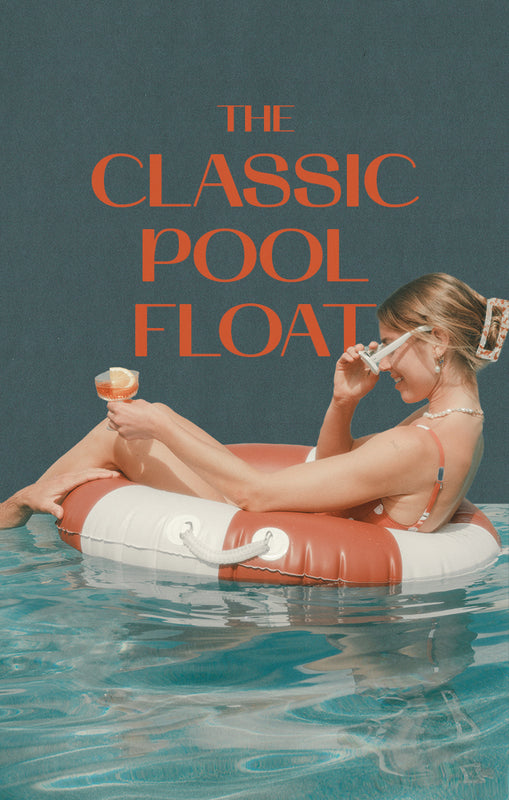 Woman floating in pool float