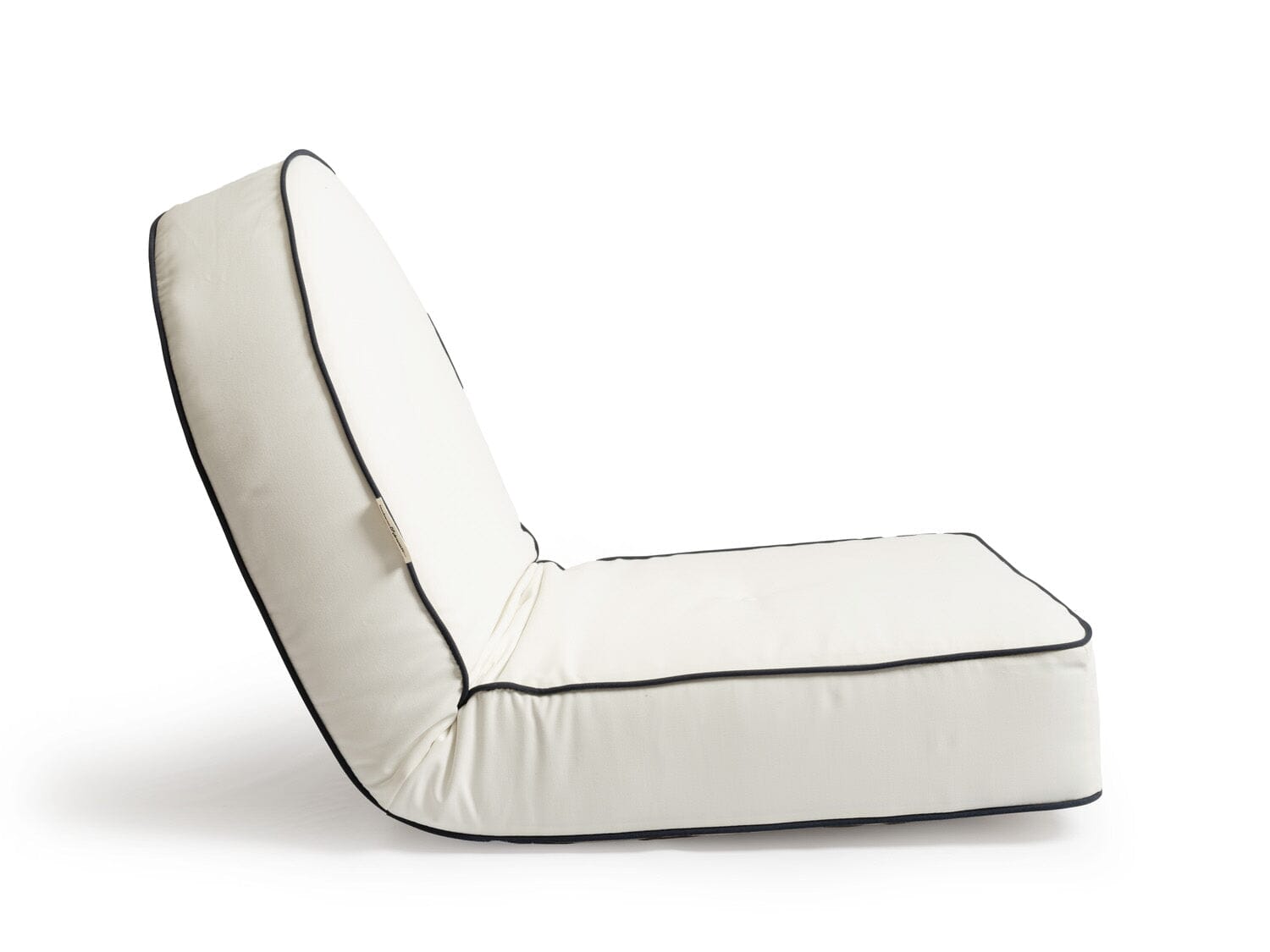 Studio image of white reclining pillow lounger