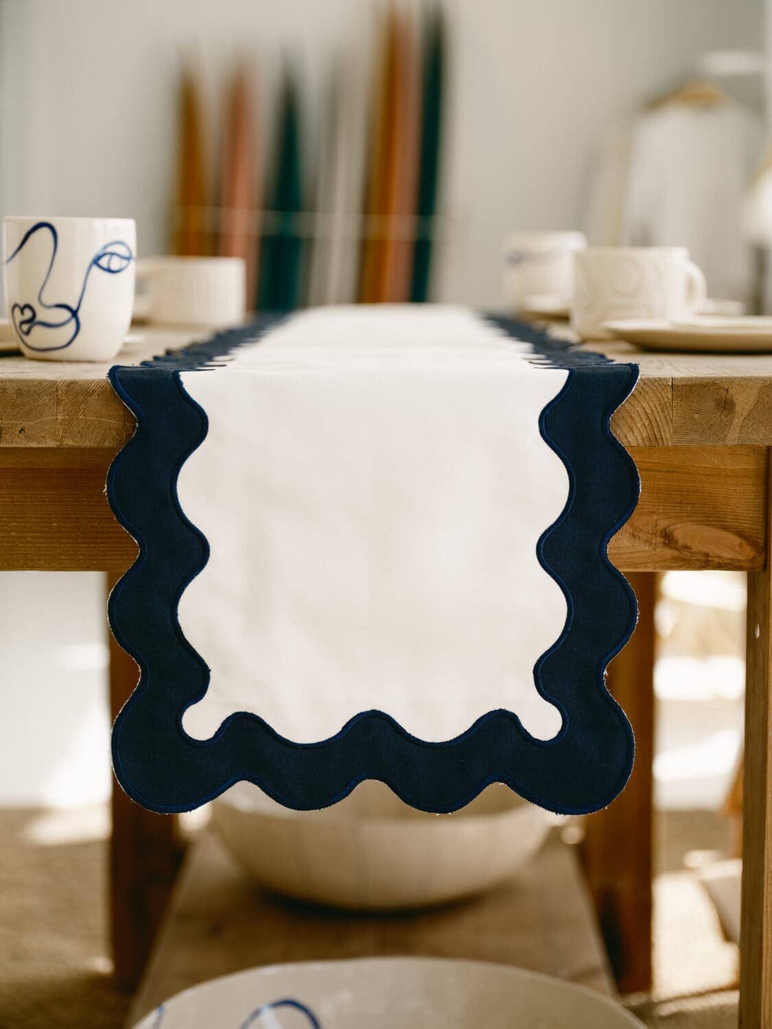 Riviera white table runner on a table