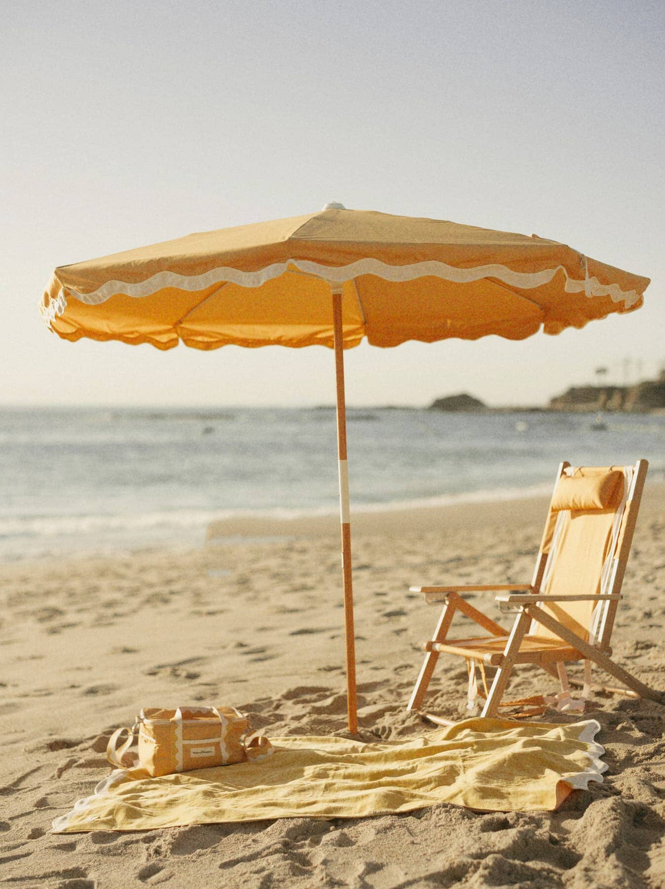 riviera mimosa beach set up with amalfi umbrella, tommy chair and accessories