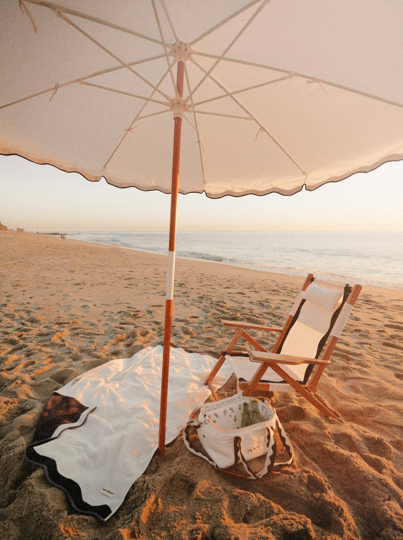 Riviera white beach set up with amalfi umbrella, chair and accessories