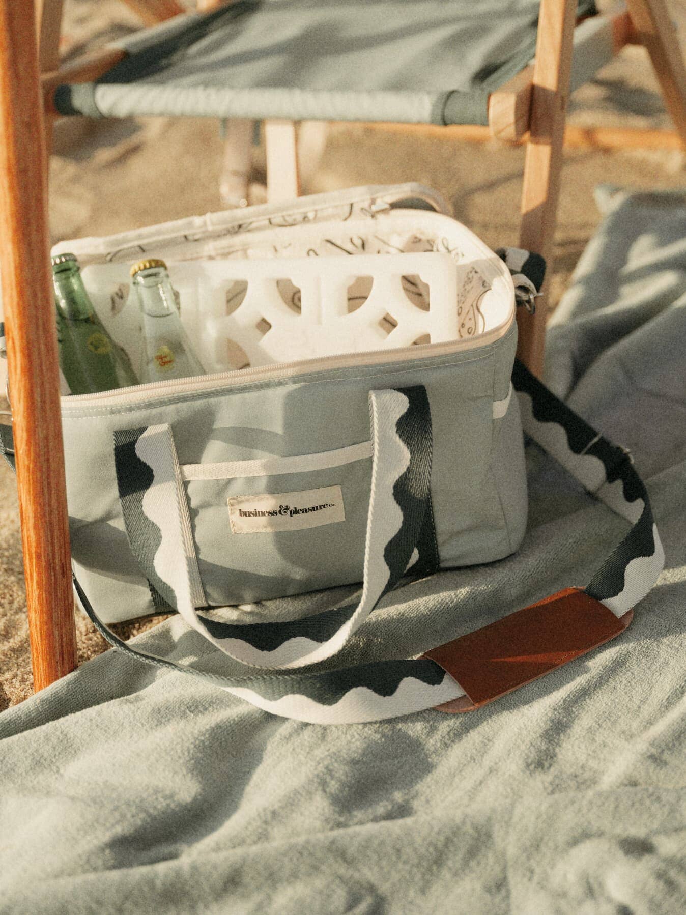 Riviera green cooler bag at the beach with ice pack