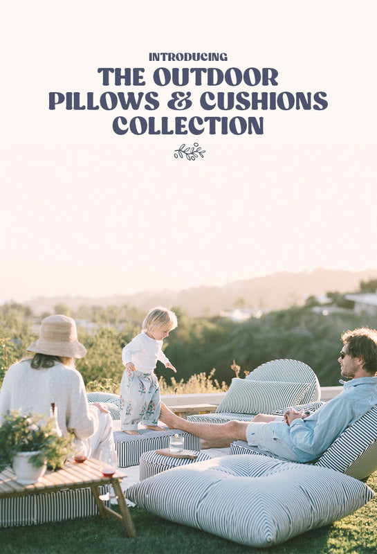 family having a picnic on the outdoor cushions