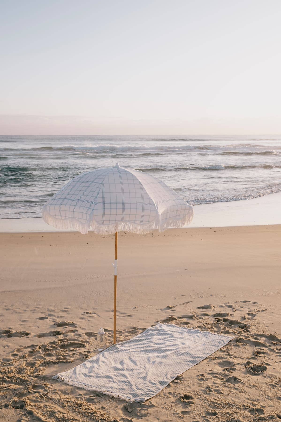 Plaid umbrella on the beach