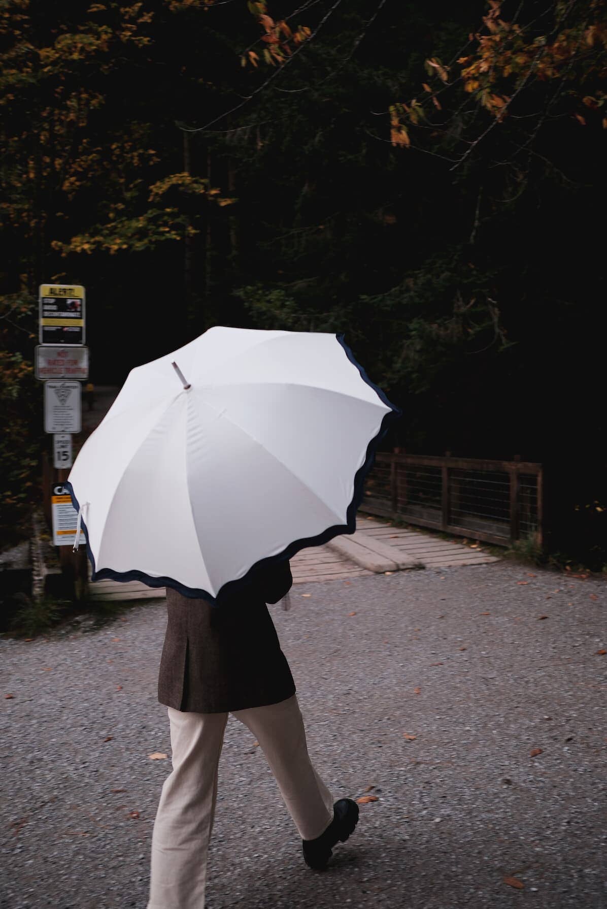 Rivie white rain umbrella in the woods