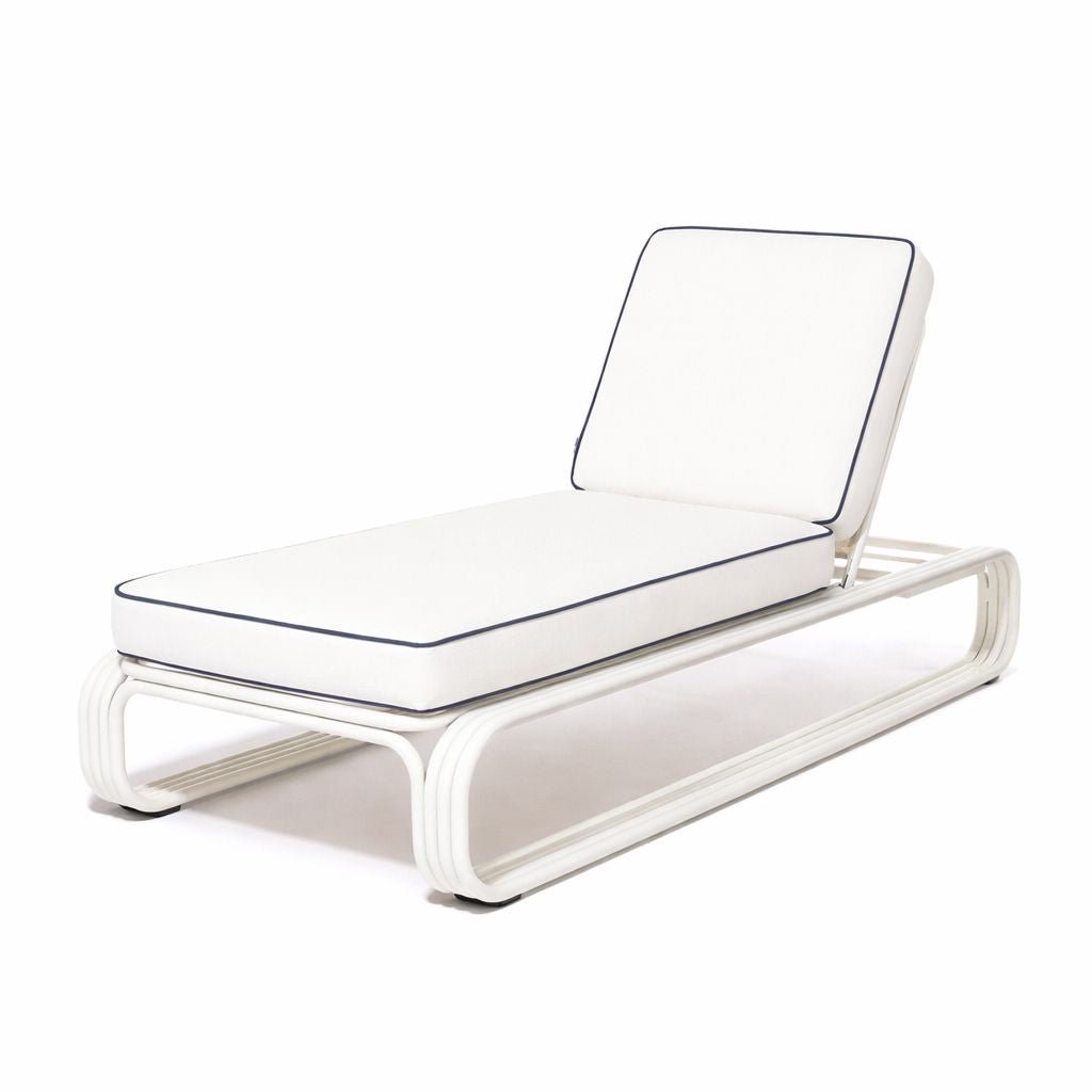 Modern white lounge chair with clear cushions on a white background
