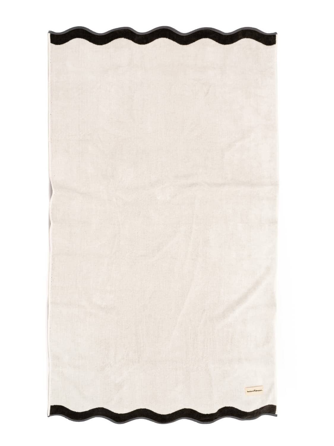 Studio image of riviera white beach towel